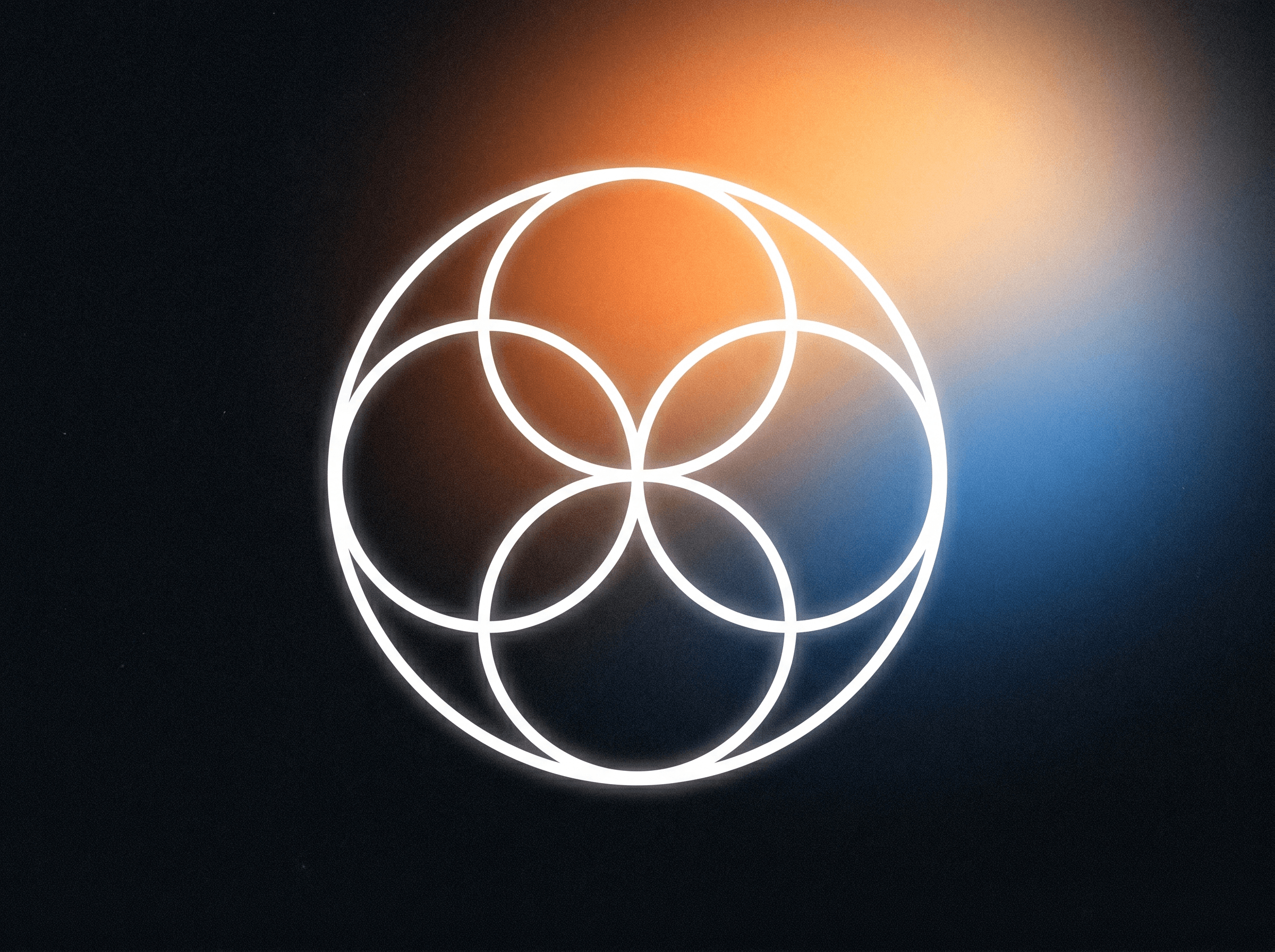 Flower-of-life geometry illuminated against deep navy